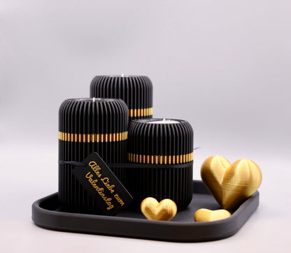 The Lume 3er Set Kerzenhalter in Schwarz mit goldenem Juppen Designring