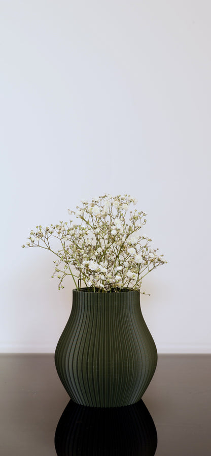 Kompakte Designvase aus PLA – Volumia klein in Linea Pure matten Farben 

Vase für kleine Blumen – stilvoller Akzent auf Regal oder Tisch

Volumia klein mit frischen Blumen – inklusive Glaseinsatz

Kleine PLA-Vasen in verschiedenen Farben – handgefertigt im Bregenzerwald
